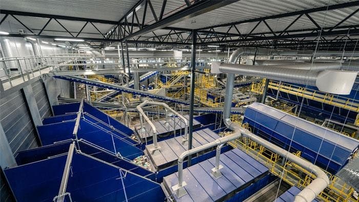 Interior of an automated material recovery facility, with sorting conveyors, separation lines and extraction ducting
